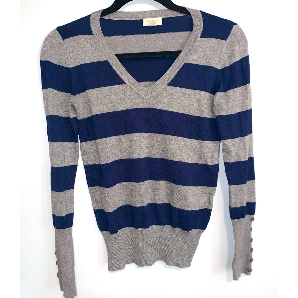 Two sweaters size small